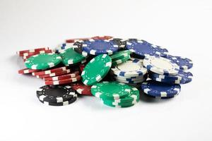 Stack of poker chips. Colorful tokens. Card game and gambling. Casino and gaming. photo