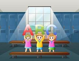 Happy student holding the letter ABC in locker room vector