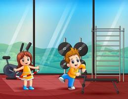 Cartoon happy children doing exercises in gym vector