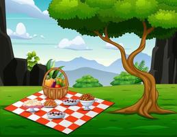 Basket and picnic blanket on the nature background vector