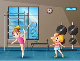 Happy two girls exercising in the gym vector