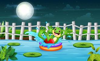 linda caricatura de rana en un círculo inflable en el río por la noche