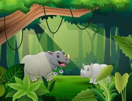 Rhinos cartoon living in the jungle illustration vector