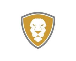 Simple shield with lion head inside vector