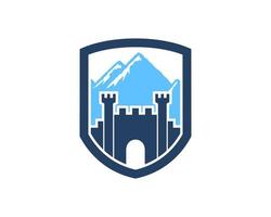 Simple shield with fortress and mountain behind vector