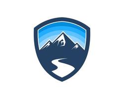 Shield with road to mountain and clear sky vector