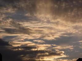 Orange clouds at sunset photo