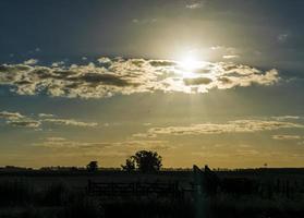 Dreamy sunset in countryside photo