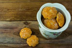 Cookies  on rustic wooden background photo