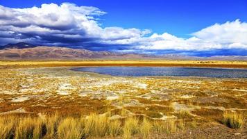 Lake in bright multi-colored steppe photo