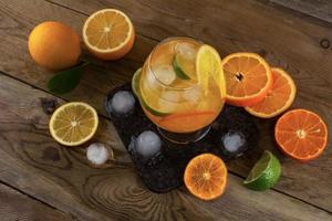 Summer drink on wooden table, top view photo