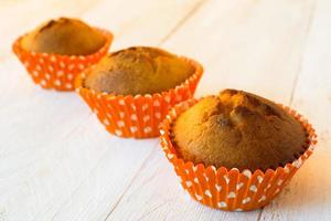 Muffins in orange holder photo