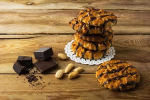 Stack of chocolate coating peanut cookies photo