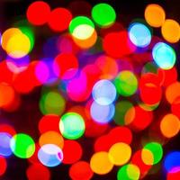 Multicolor lightbulb bokeh background, square photo