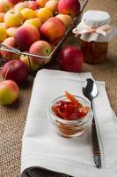 Glass jars of apple confiture photo