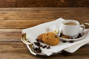 Tea and cookies on serving tray photo