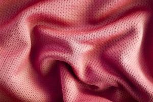 Sport clothing fabric texture background, top view of cloth textile surface photo