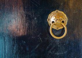 Chinese ancient buildings, mottled and brass door knocker photo