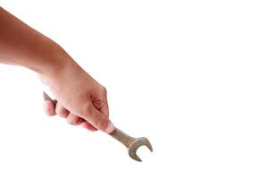 Mechanic hand hold spanner tool in hand photo