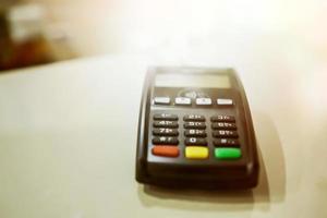 payment terminal on a blurred background. photo