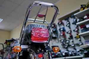 Turn signal indicator light of motorcycle model scene. photo