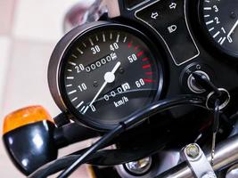speedometer motorcycle with zero mileage. The bike is in the shop photo