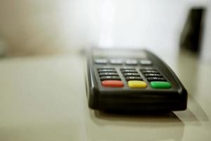 payment terminal close-up on a blurred background. photo