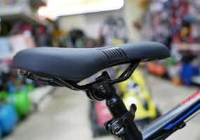 Black Bicycle seat. Bicycle background. Bike shop photo