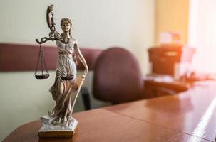 Law and Justice concept. Mallet of the judge, books, scales of justice.  Courtroom theme. photo