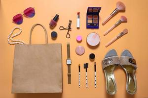 Creative flat lay composition of woman fashion and beauty accessories photo