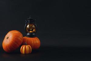 Various cute Halloween decoration on black background photo