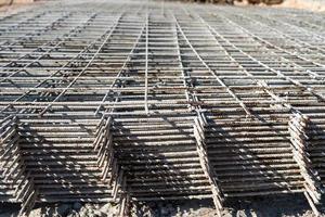 Steel grating is prepared to make cement floors for construction photo