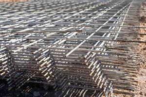 Steel grating is prepared to make cement floors for construction photo