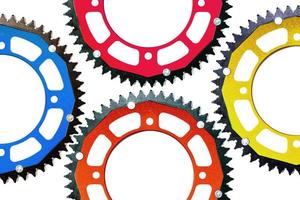 chainrings rear sprocket of a motorcycle on a white background photo