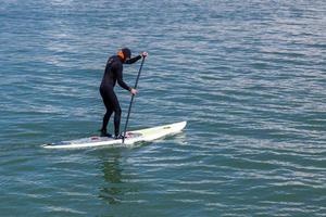 SAUSALITO, CALIFORNIA, USA, 2011. Paddling surf board photo