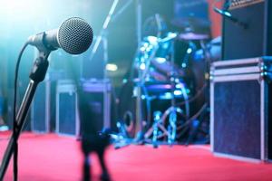 Microphone and music instrument on stage for background photo