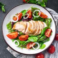 chicken breast salad Easter salad vegetable tomato, onion, green mix leaves lettuce photo