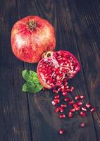 Fresh pomegranate on the wooden table