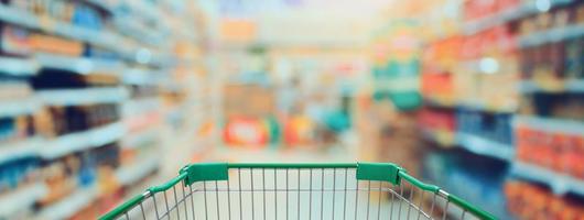 Shopping in Supermarket with shopping cart photo