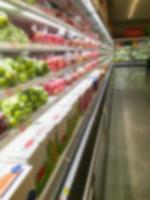 Shelf with fruits in supermarket photo