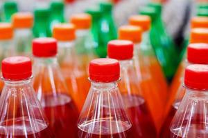 Bottles with soft drinks photo