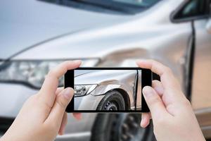 woman using mobile smartphone take photo car crash accident