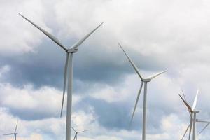 Wind turbines with the clouds and sky photo