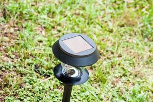 Solar power garden lamp photo