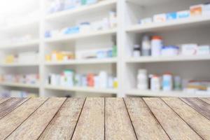 pharmacy product display counter with drugstore shelves photo