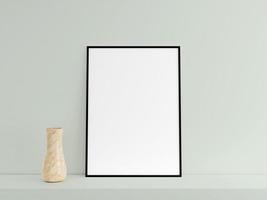 Customizable minimalist vertical black poster or photo frame mockup on the podium table with vase. 3D Rendering.