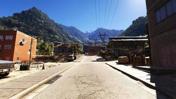 A road that runs through a remote village in the countryside Forest nature 3D rendering photo