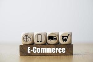 Online shopping and e-commerce icon include trolley cart credit card and delivery truck concept. photo