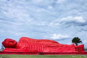 The red buddha statue at Songkhla, Thailand photo