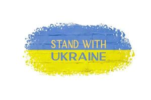 Brick texture in the colors of the yellow-blue flag of ukraine and text Stand with Ukraine photo